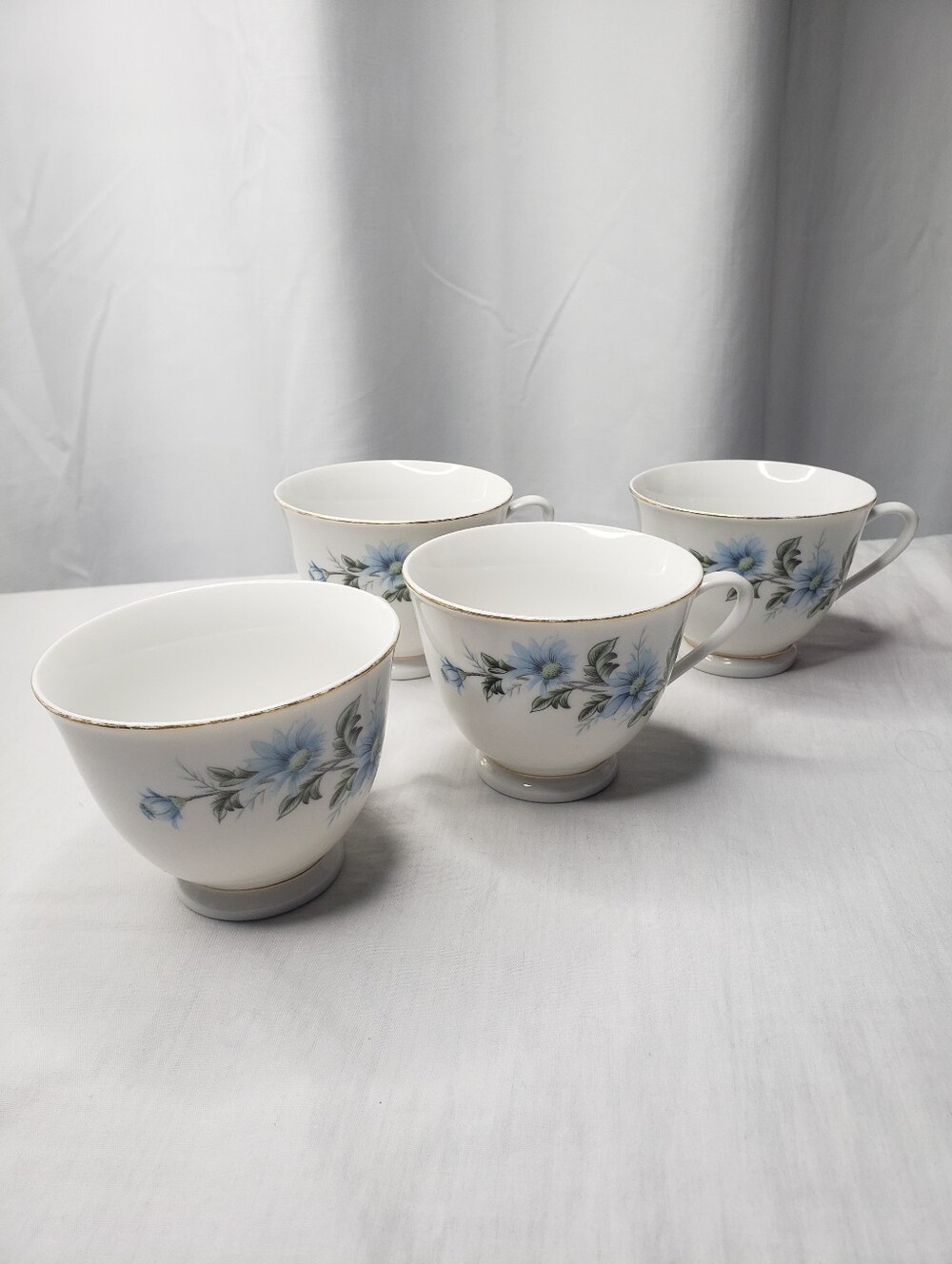 Four Ceramic Tea Cups Blue Daisies
